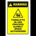 Sign warning forklifts in use proceed slowly when authorised